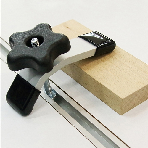 T-track 'hold-down' bovenklem voor 'A' en 'B'
